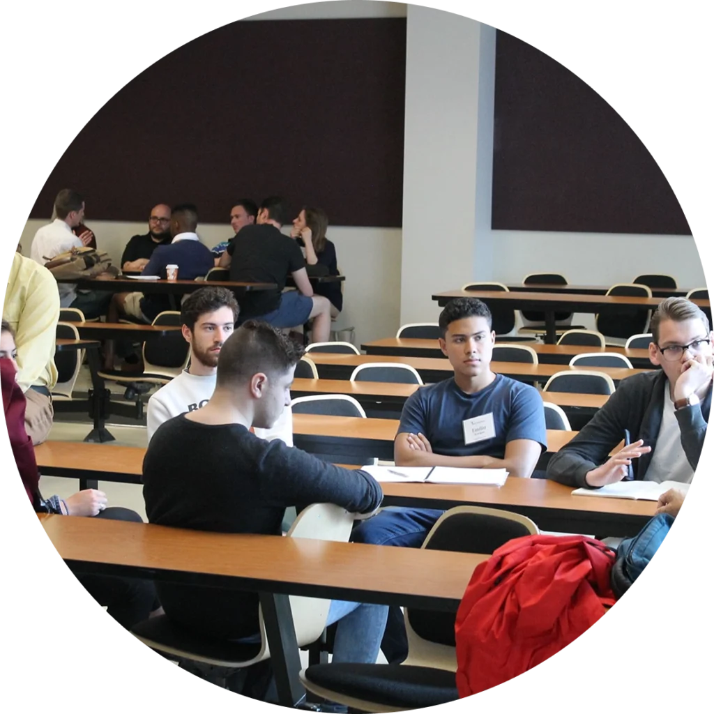 A group of students sit at a table